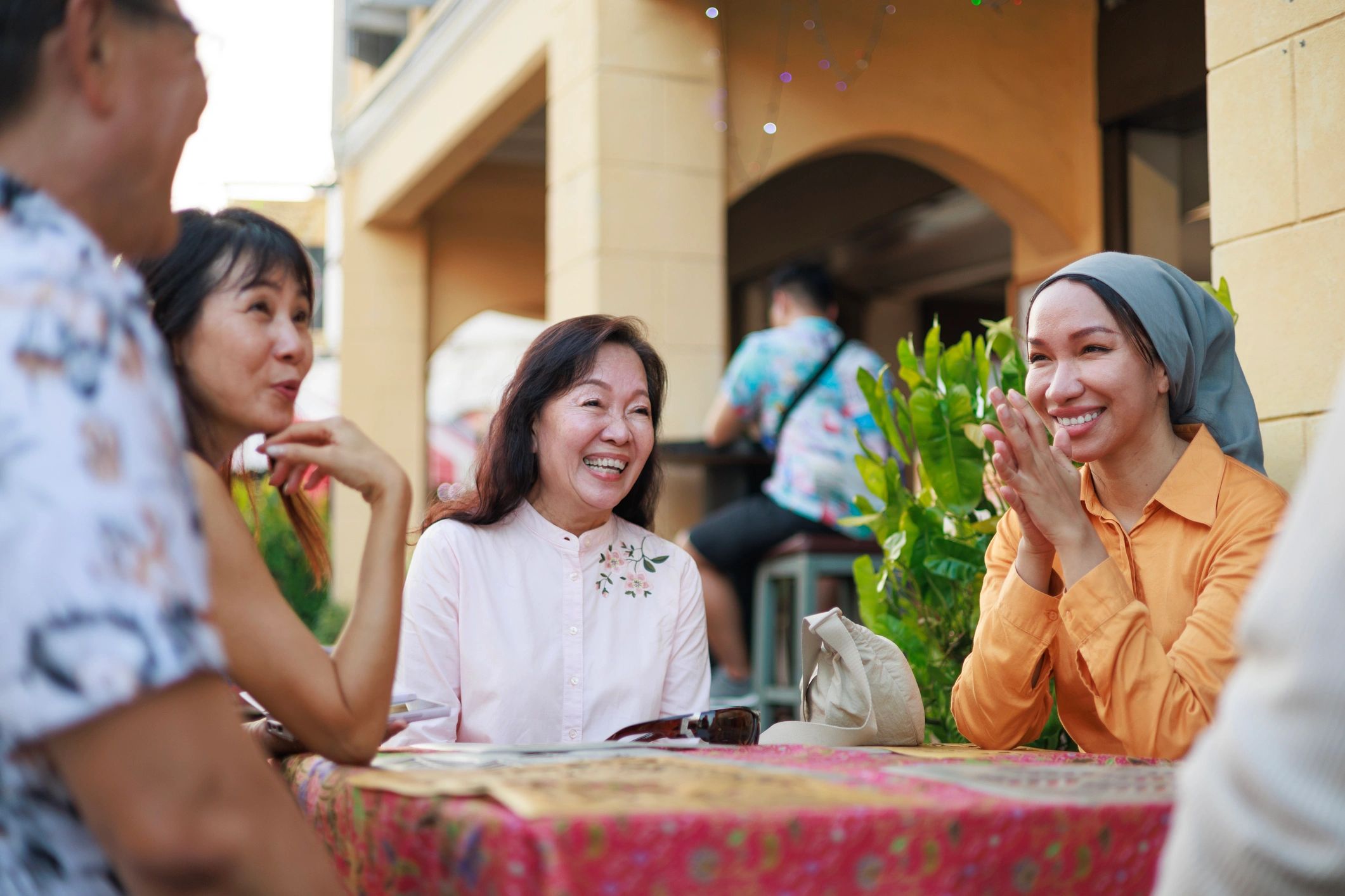 Travelers enjoying street food at a market